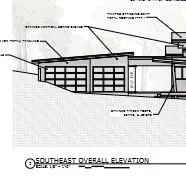 a backyard of a house with a tree
