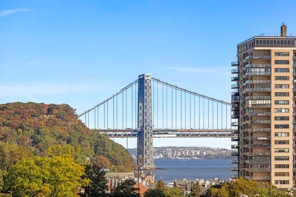 a kitchen with a sink stove and refrigerator