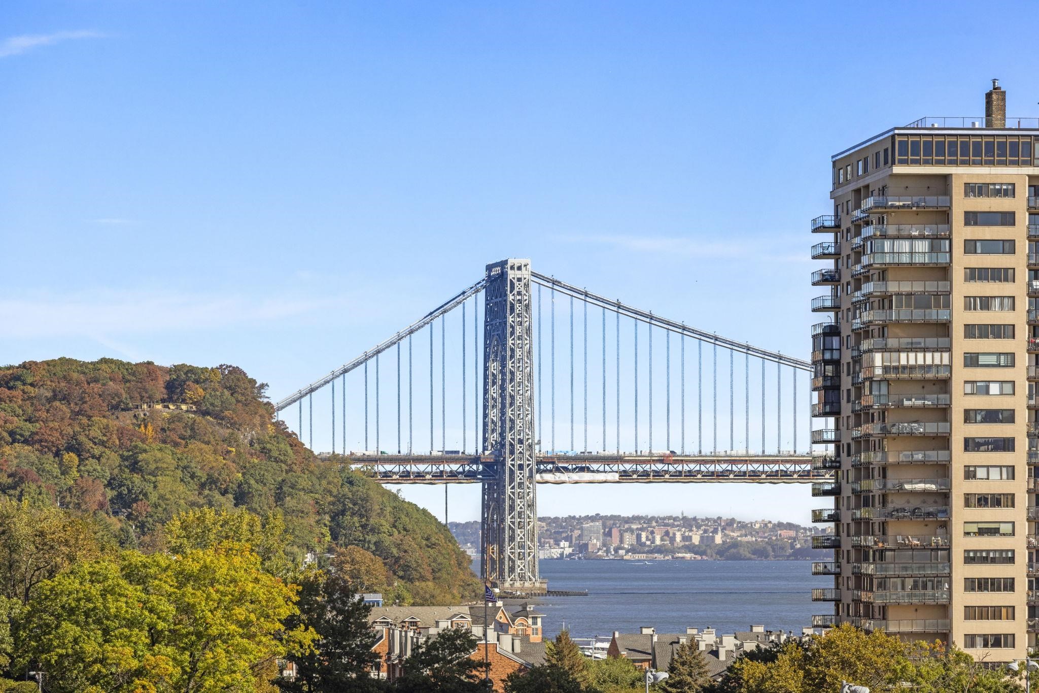 67 Highway 5 Edgewater, NJ 07020 - Photo 17 of 23 a view of balcony with wooden fence