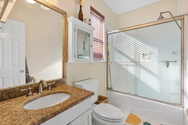 a front view of a house with garage