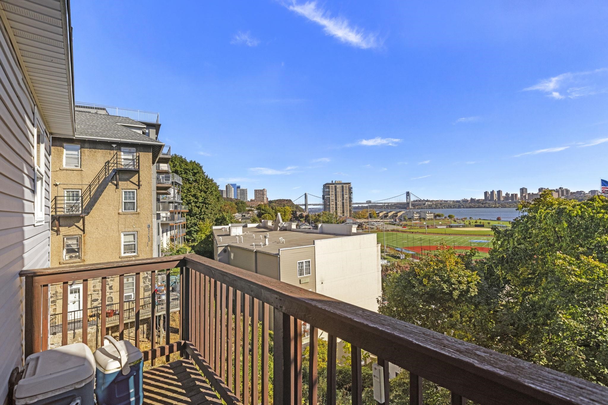 67 Highway 5 Edgewater, NJ 07020 - Photo 3 of 23 a view of a city from a balcony