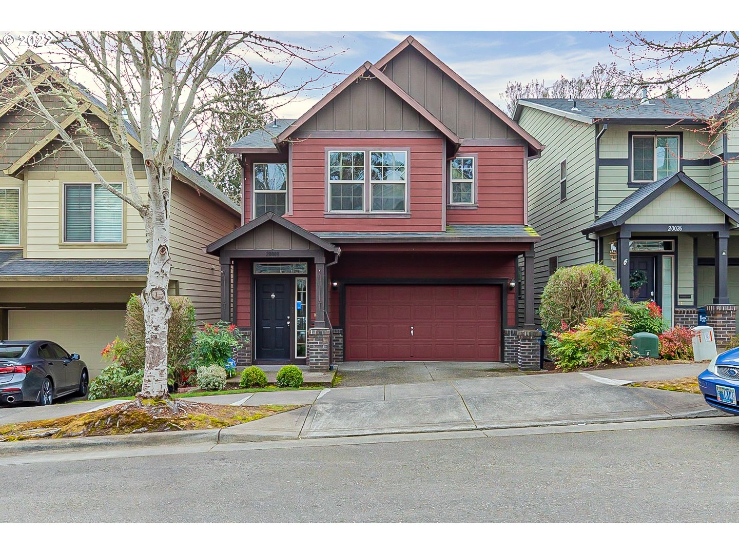 20008 Southwest Jette Lane Beaverton, OR 97003 - Photo 1 of 32 a front view of a house with a yard and garage