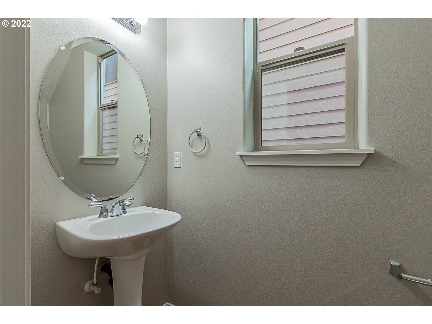 20008 Southwest Jette Lane Beaverton, OR 97003 - Photo 12 of 32 a bathroom with a sink and a mirror