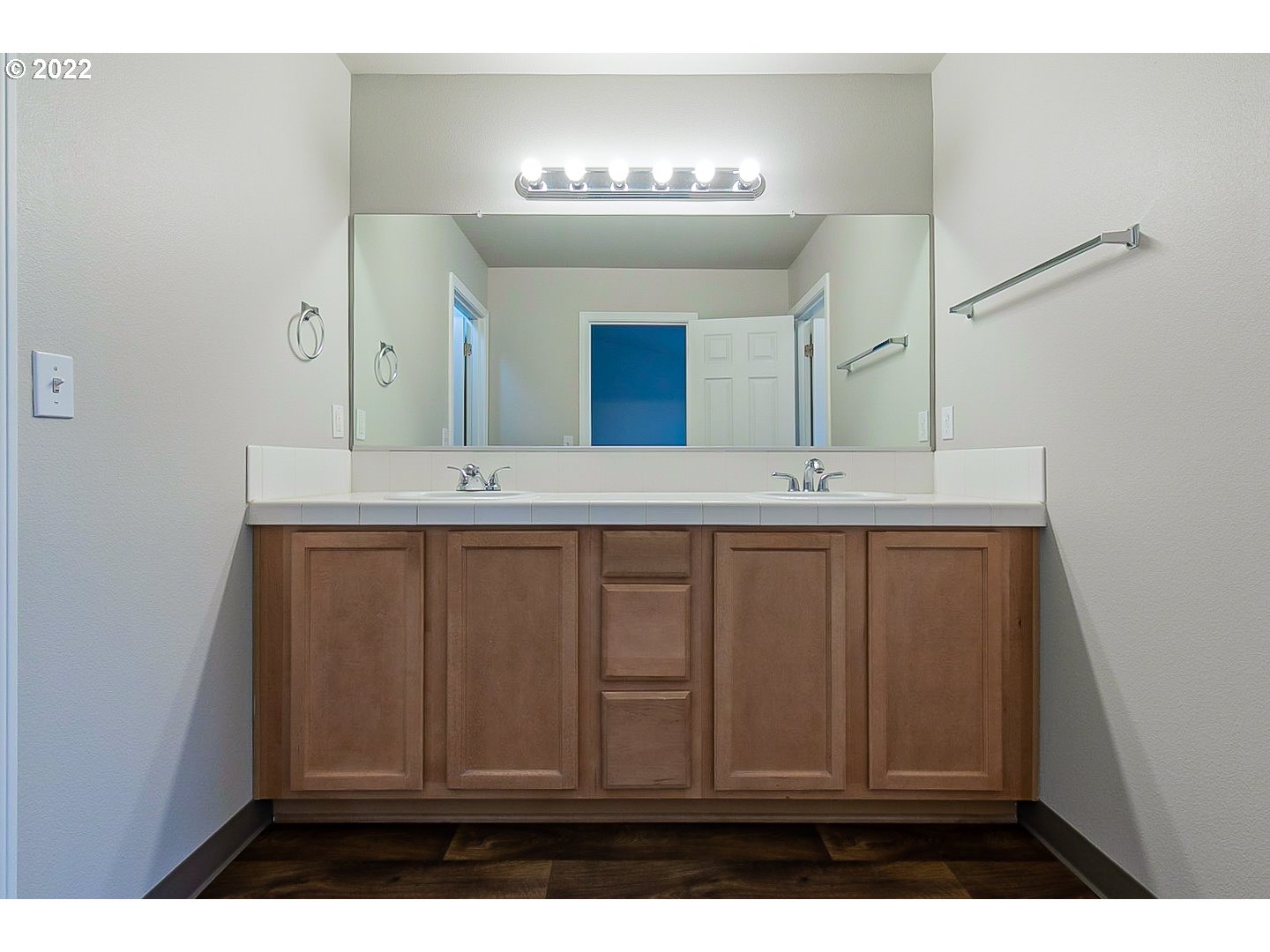20008 Southwest Jette Lane Beaverton, OR 97003 - Photo 18 of 32 a bathroom with a sink vanity and a mirror