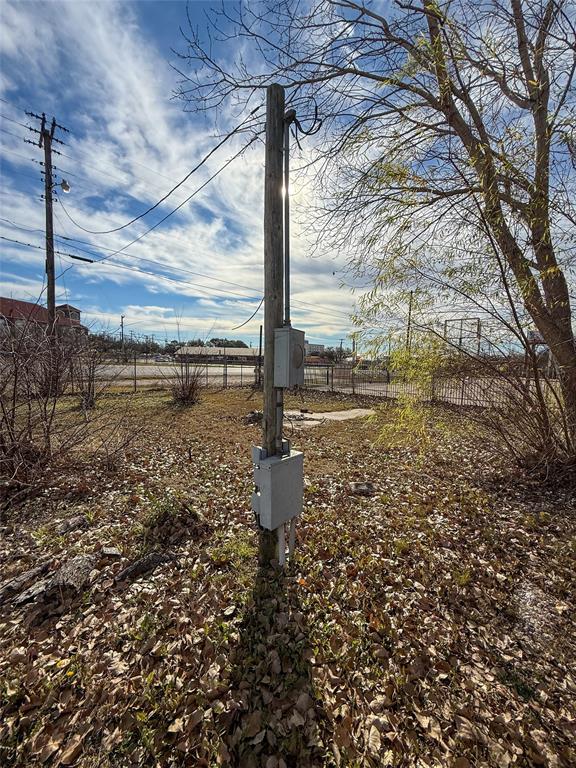 1709 North Main Street Cleburne, TX 76033 - Photo 11 of 14 a view of a lake with tall trees