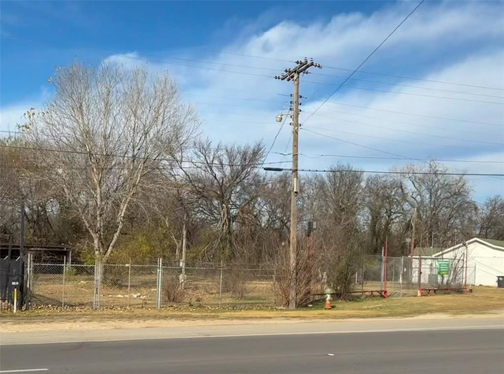 1709 North Main Street Cleburne, TX 76033 - Photo 2 of 14 a view of a building with a street