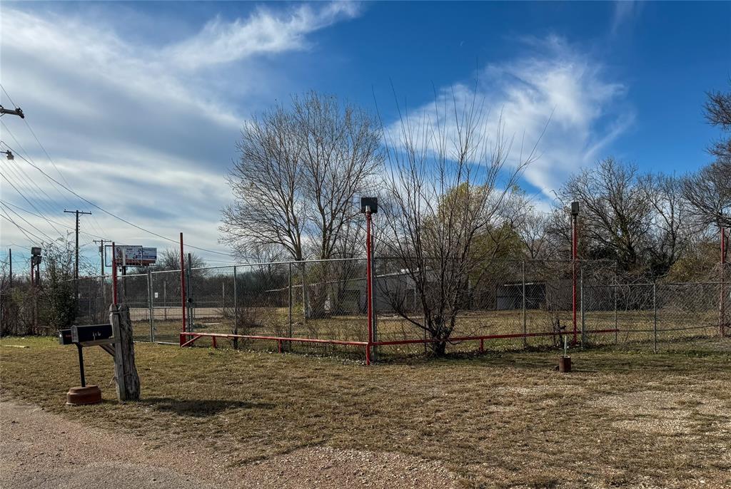 1709 North Main Street Cleburne, TX 76033 - Photo 3 of 14 a view of outdoor space with trees