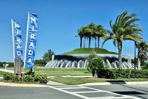 a view of a swimming pool with a lake view