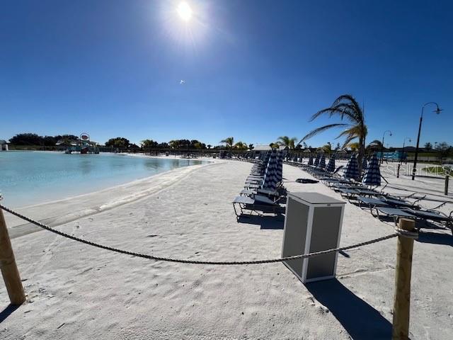 10373 Lavender Aster Trail San Antonio, FL 33576 - Photo 26 of 34 a view of a swimming pool with a lake view
