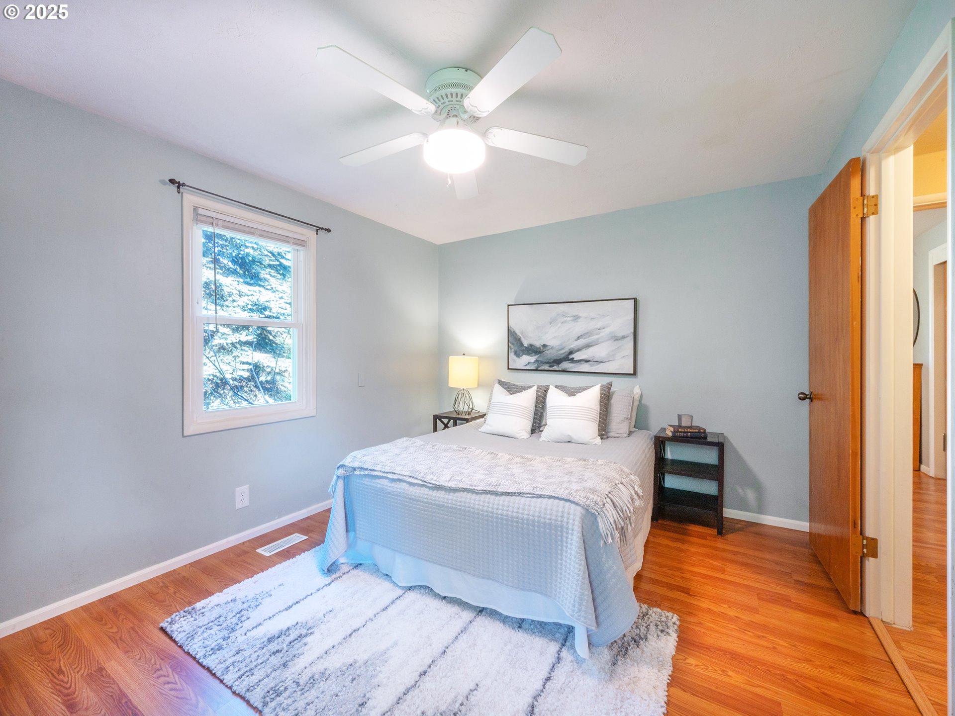 464 Spring Creek Drive Eugene, OR 97404 - Photo 11 of 45 a bedroom with a large bed and a window