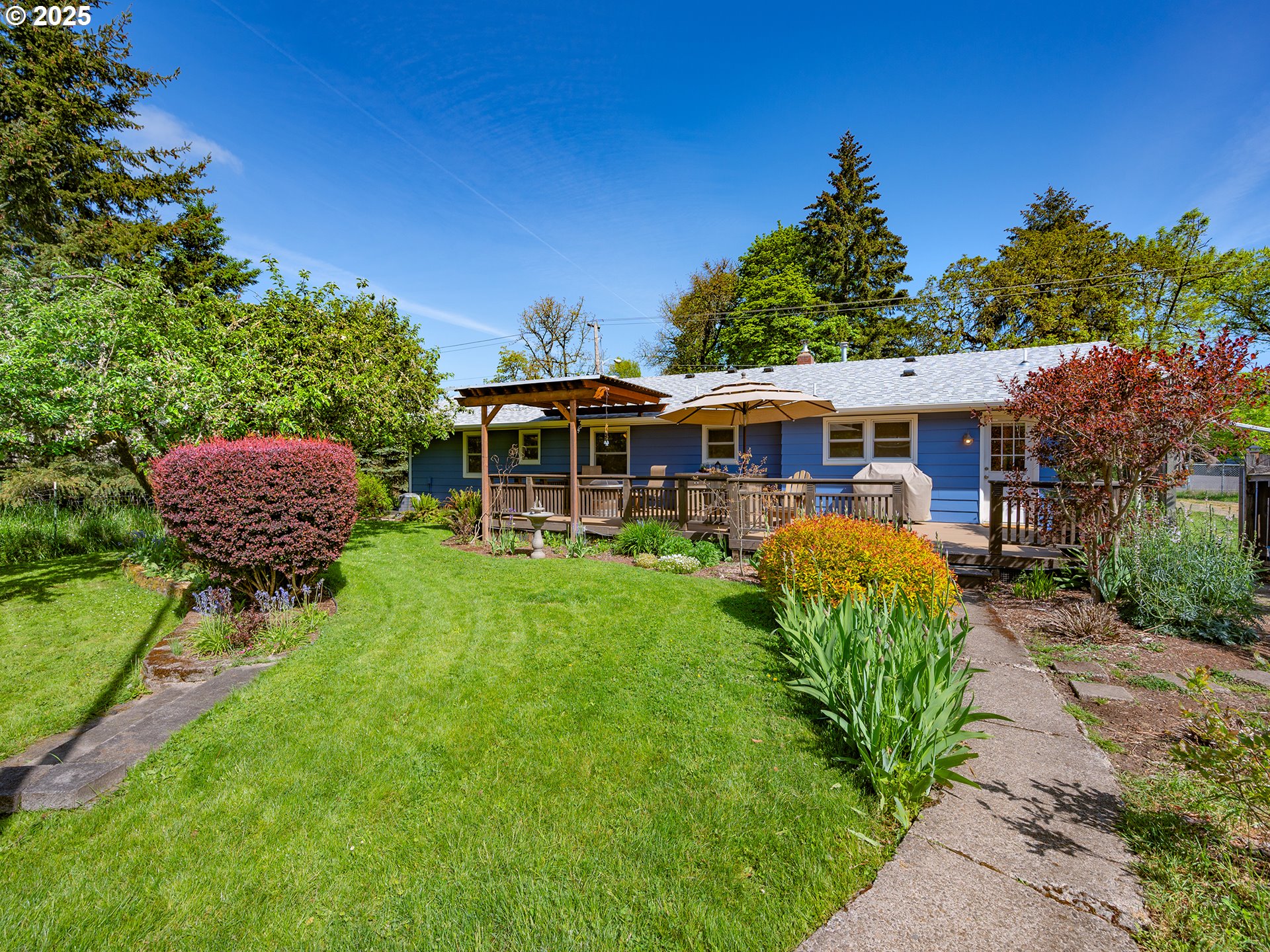 464 Spring Creek Drive Eugene, OR 97404 - Photo 21 of 45 a view of a house with a backyard