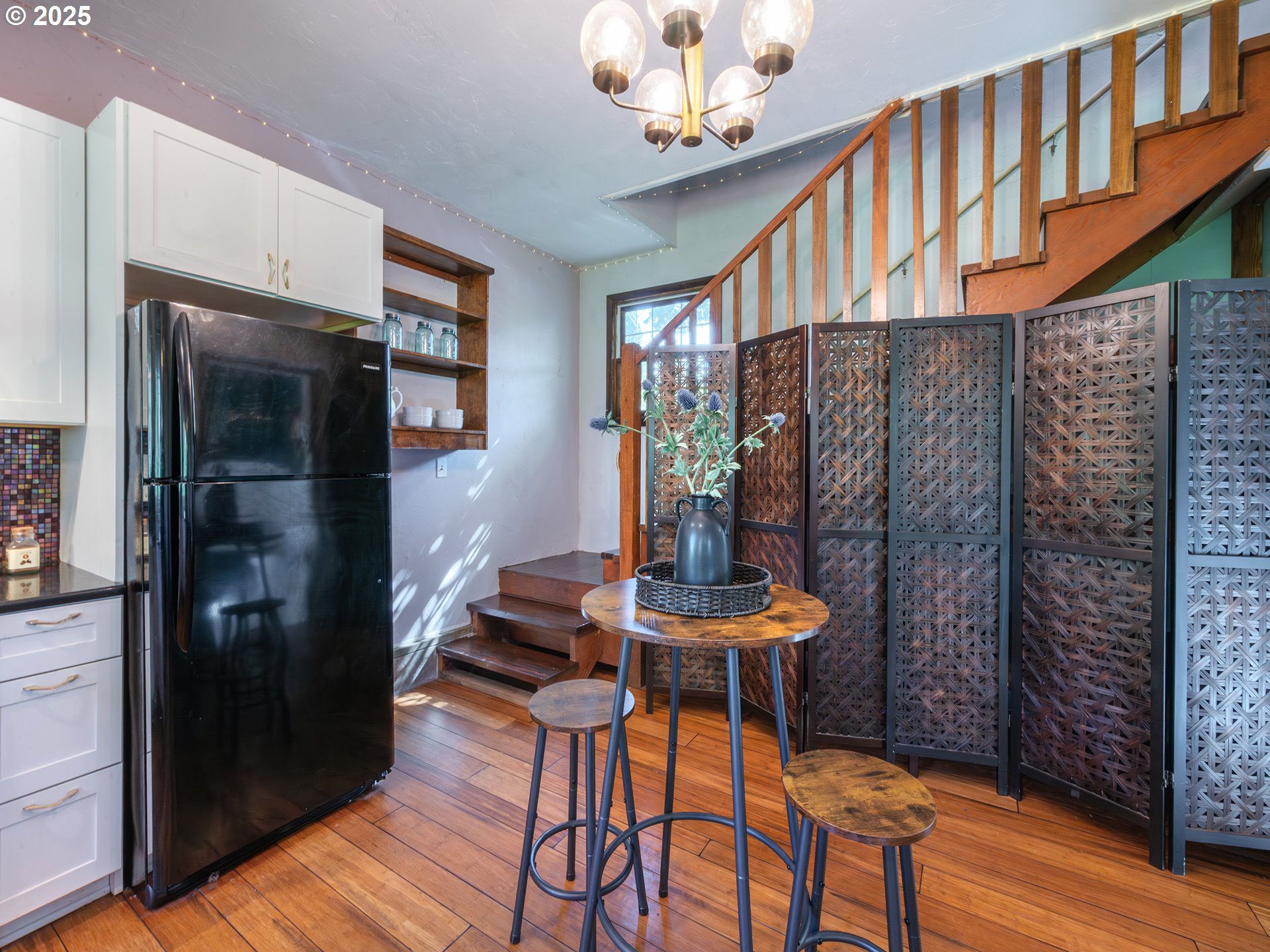 464 Spring Creek Drive Eugene, OR 97404 - Photo 28 of 45 a view of a room with furniture and wooden floor