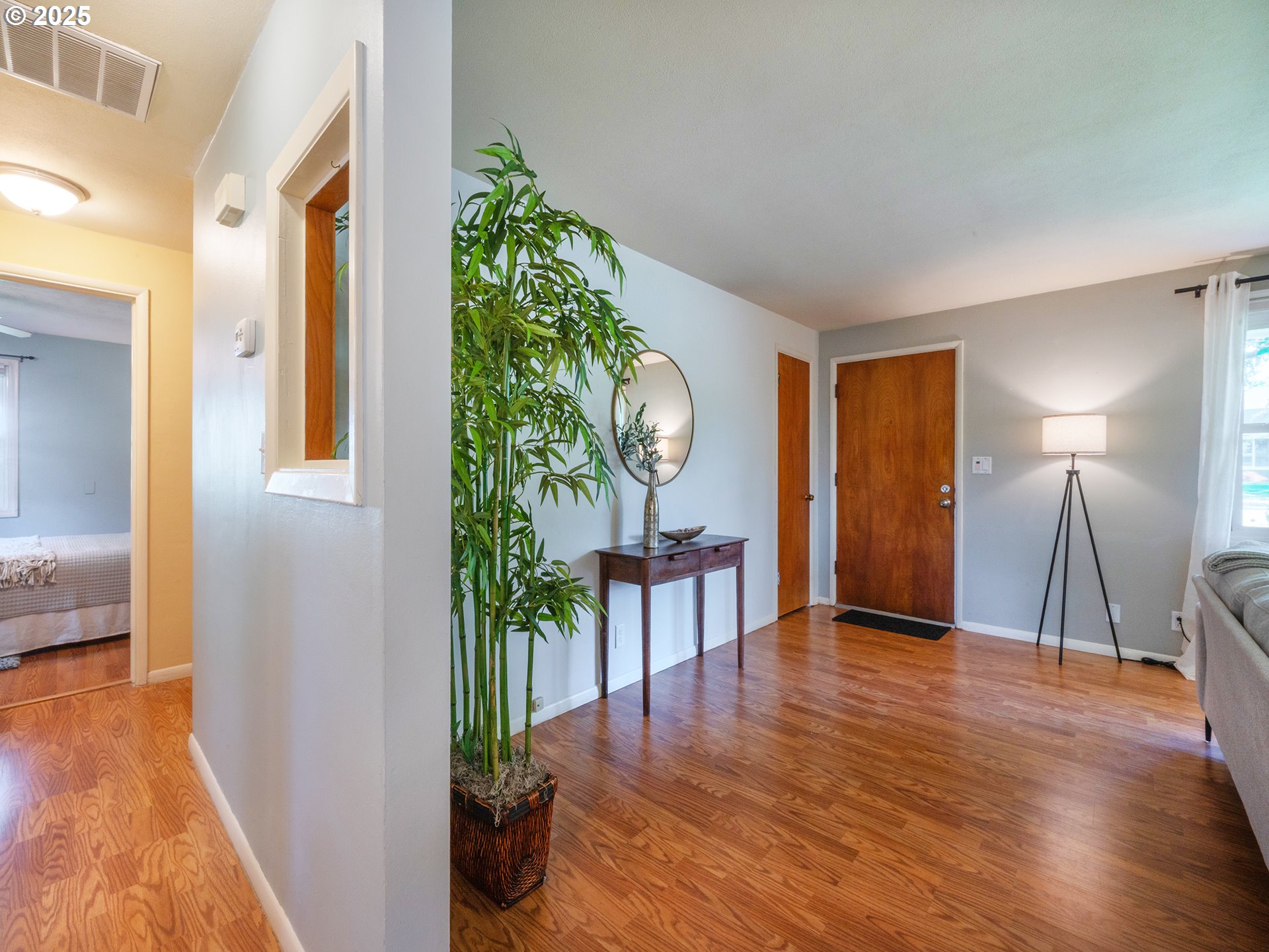 464 Spring Creek Drive Eugene, OR 97404 - Photo 3 of 45 a view of an entryway with wooden floor