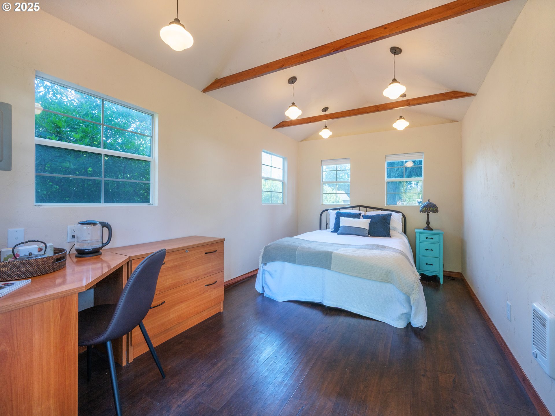 464 Spring Creek Drive Eugene, OR 97404 - Photo 32 of 45 a bedroom with a bed and window