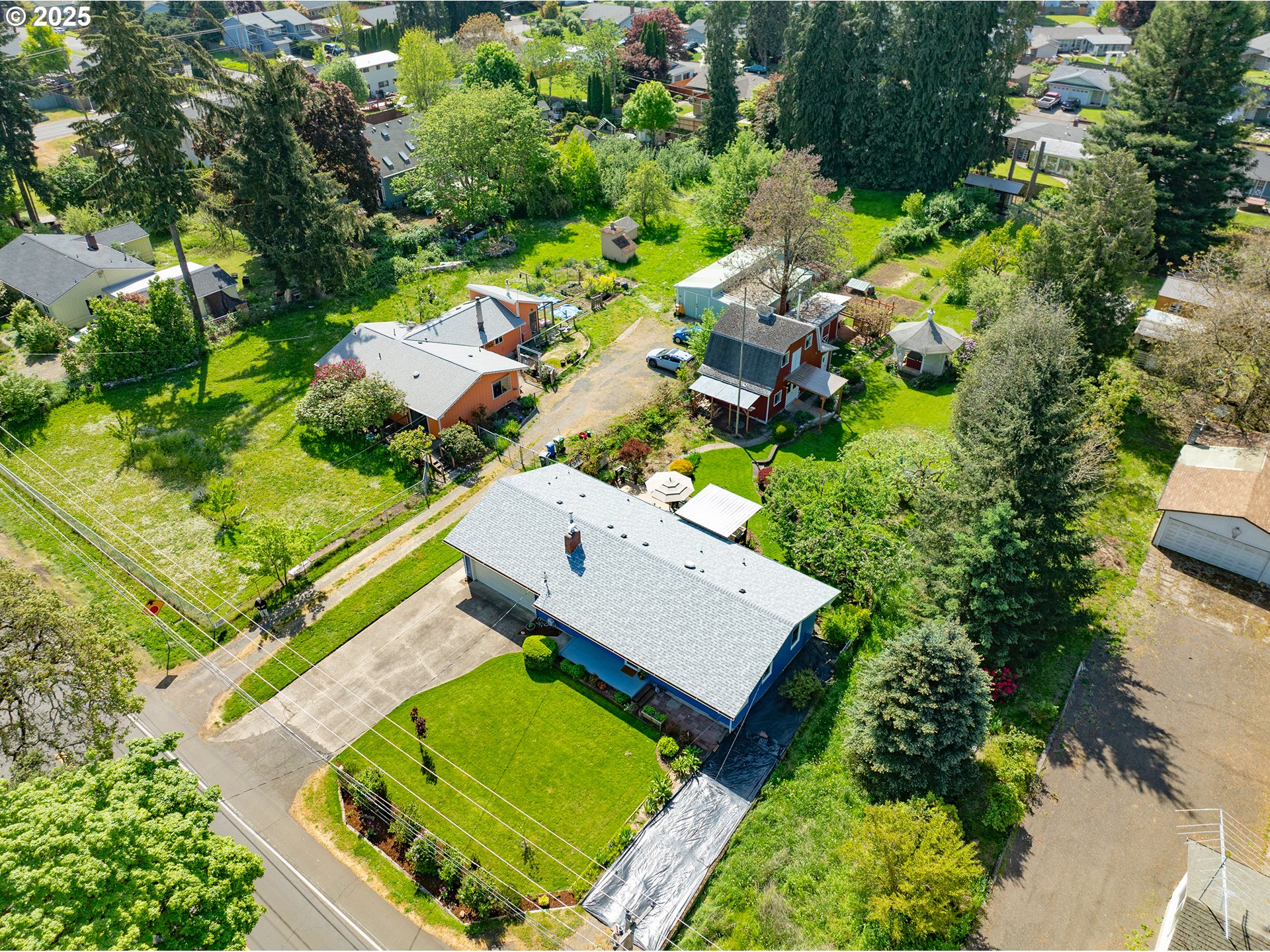 464 Spring Creek Drive Eugene, OR 97404 - Photo 40 of 45 an aerial view of a house with a yard basket ball court and outdoor seating
