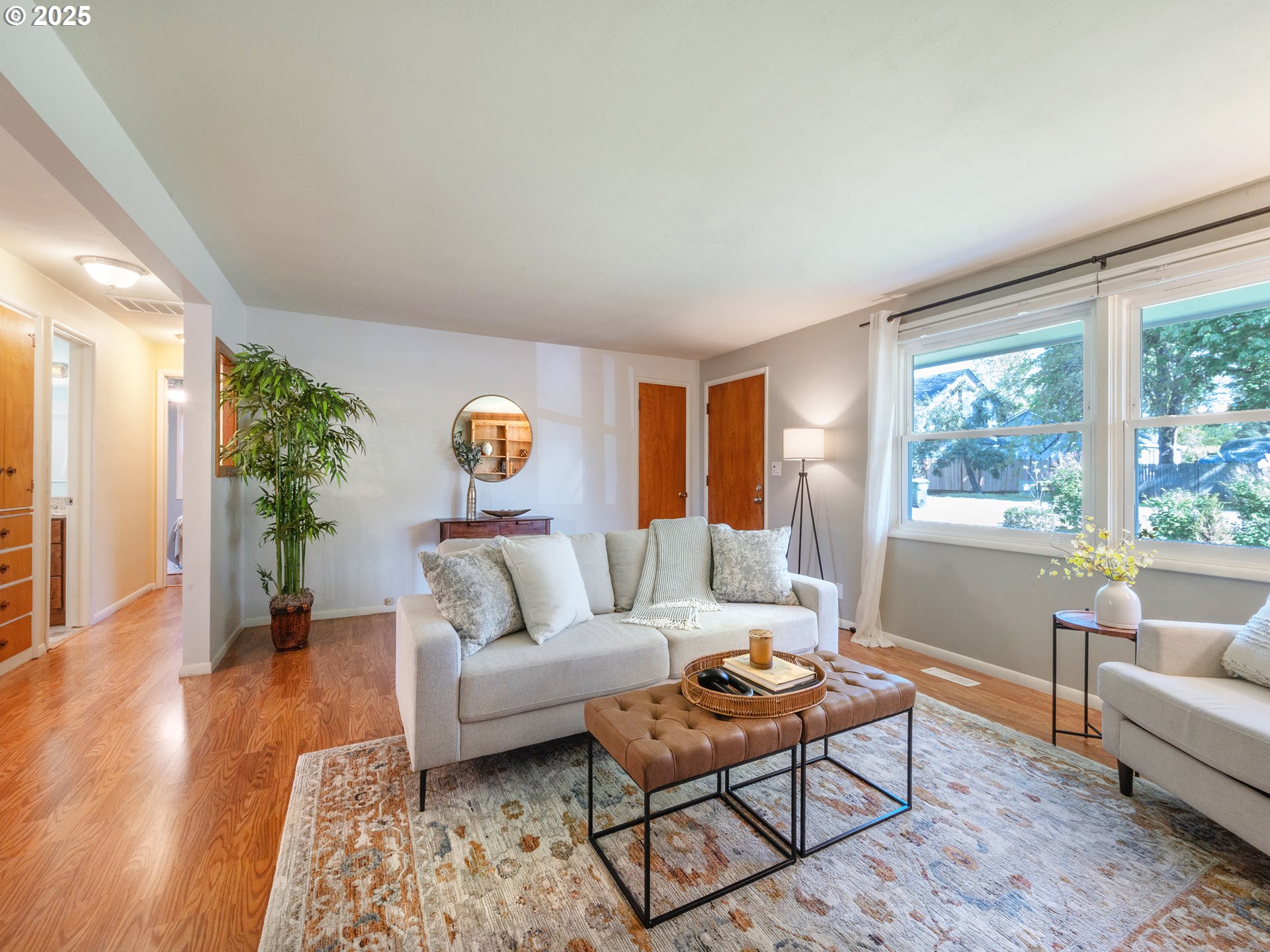464 Spring Creek Drive Eugene, OR 97404 - Photo 4 of 45 a living room with furniture and wooden floor