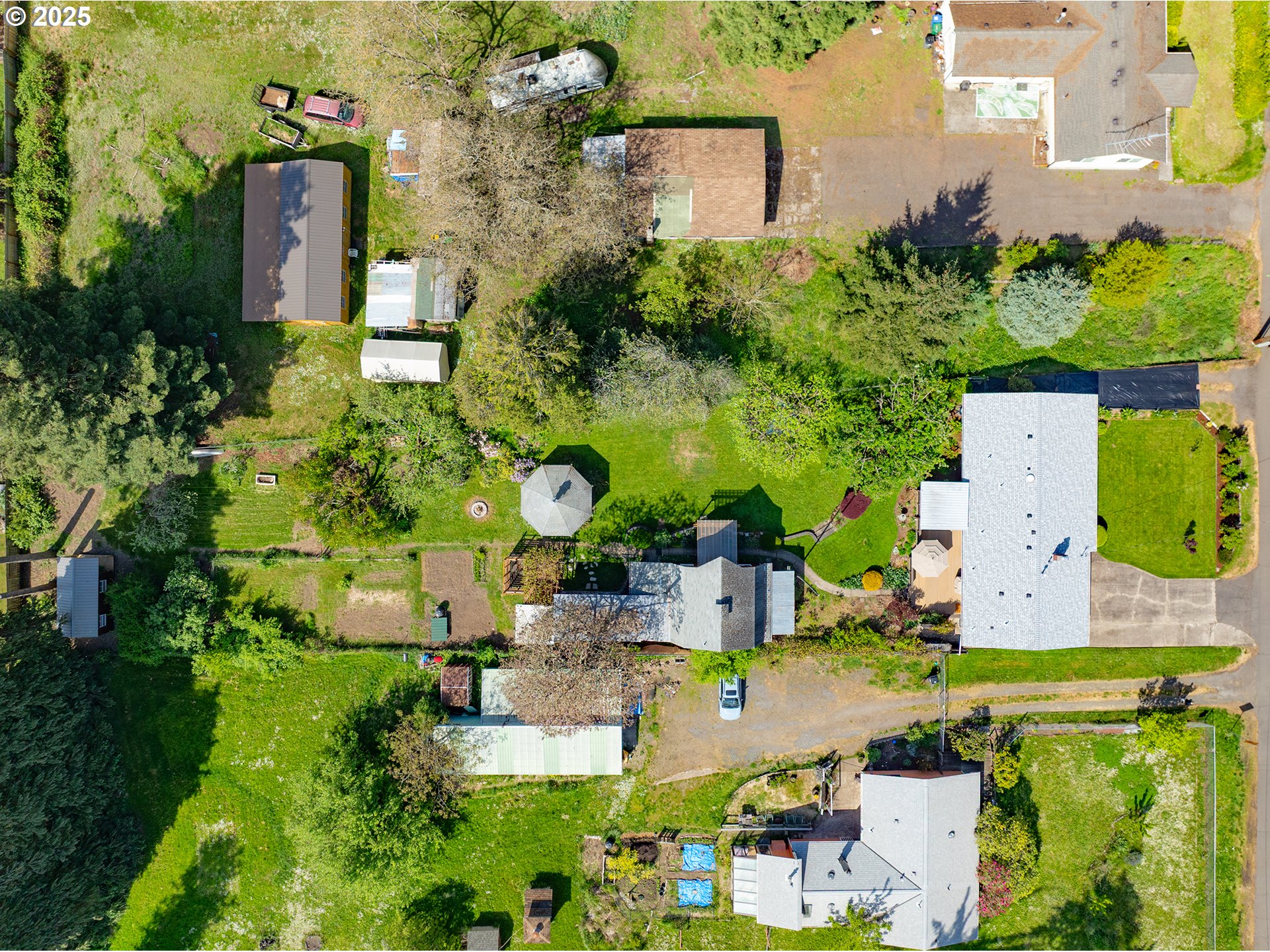 464 Spring Creek Drive Eugene, OR 97404 - Photo 43 of 45 an aerial view of a house with a yard basket ball court and outdoor seating