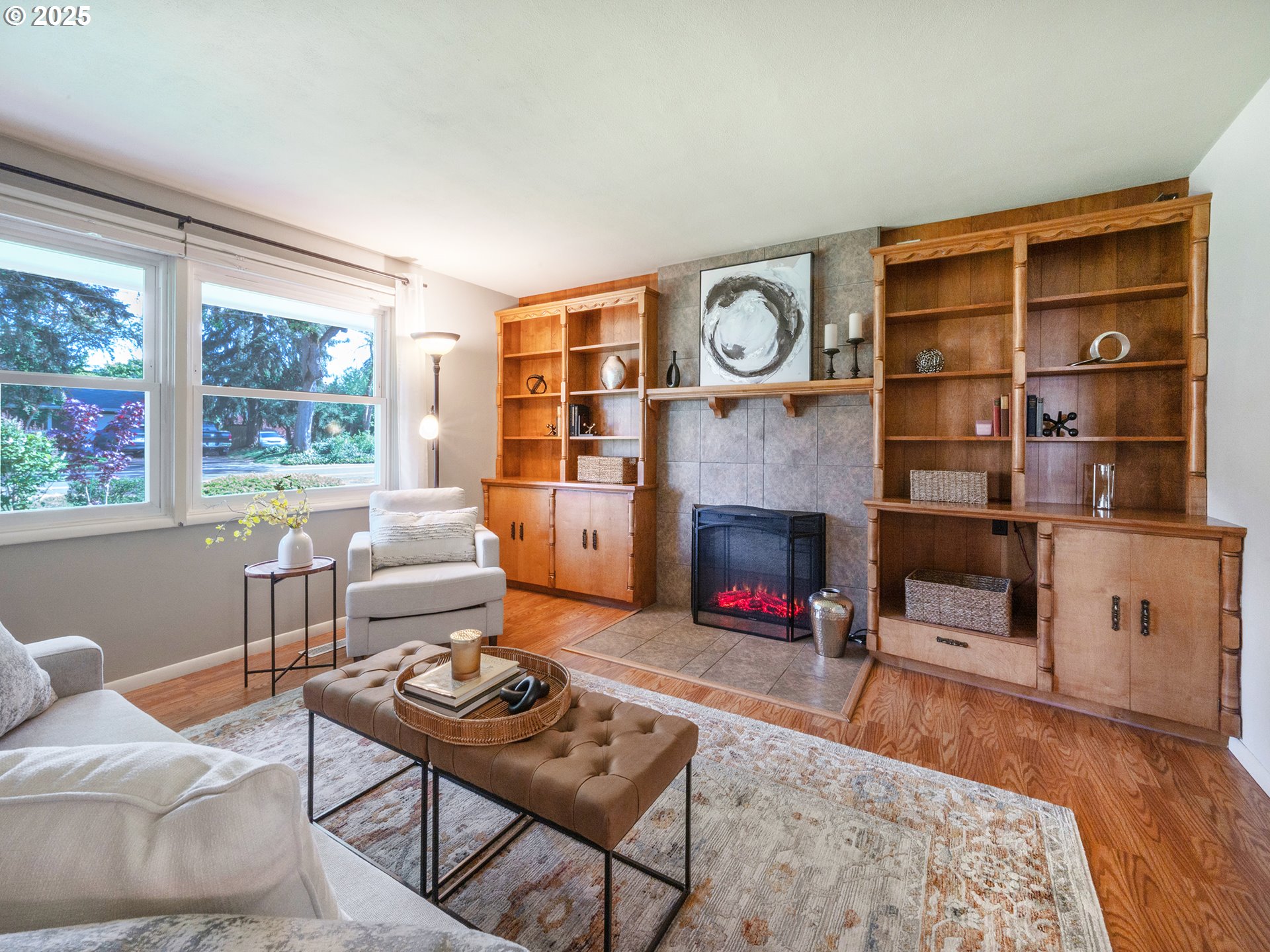 464 Spring Creek Drive Eugene, OR 97404 - Photo 5 of 45 a living room with furniture a window and a fireplace