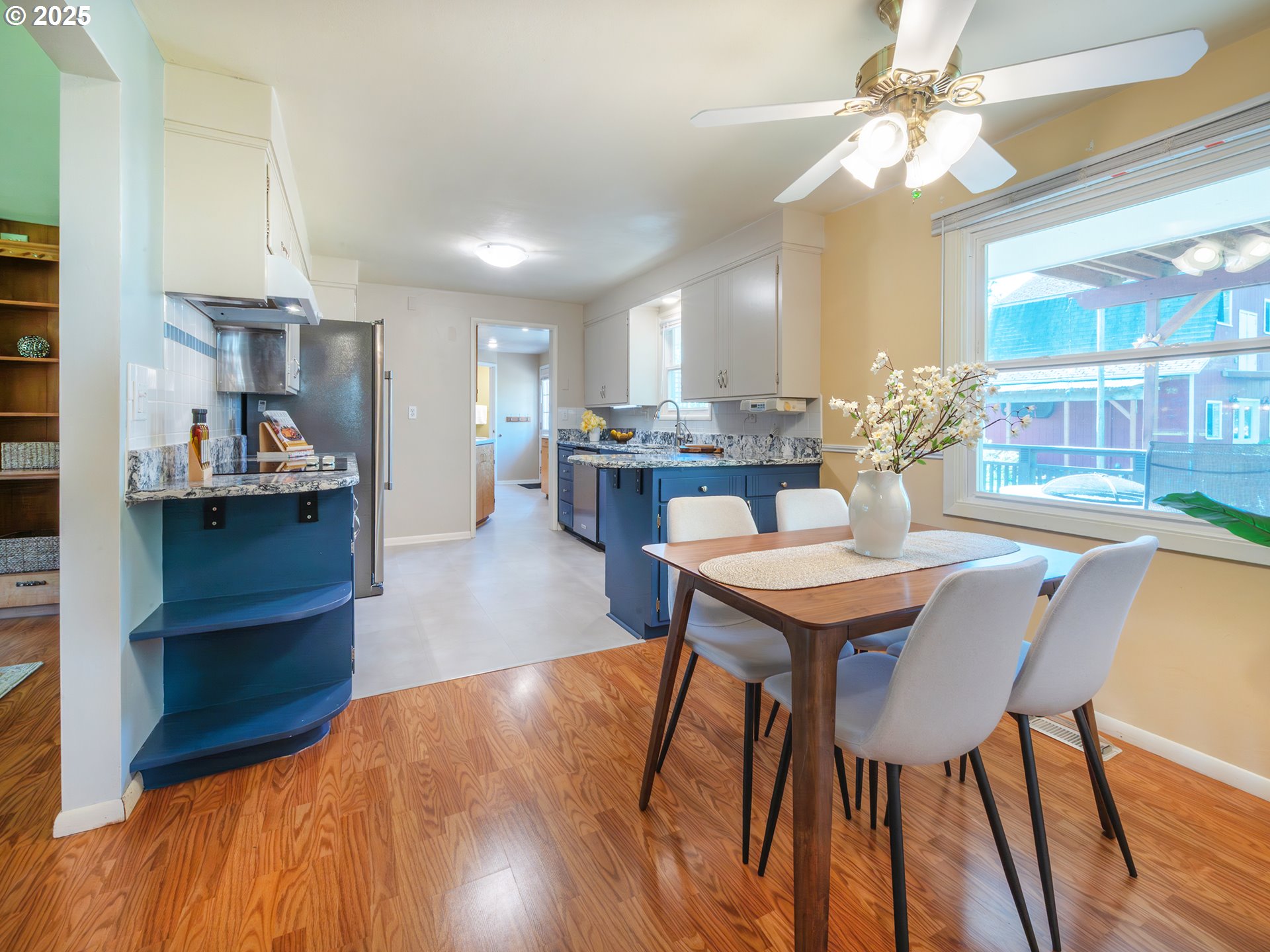 464 Spring Creek Drive Eugene, OR 97404 - Photo 6 of 45 a view of a dining room with furniture and a chandelier