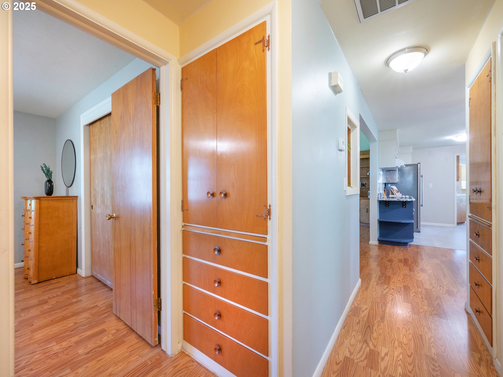 464 Spring Creek Drive Eugene, OR 97404 - Photo 9 of 45 a view of hallway with wooden floor
