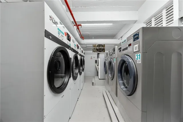 a utility room with dryer and washer