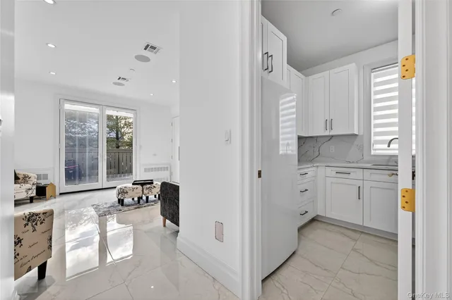 a view of balcony and wooden floor