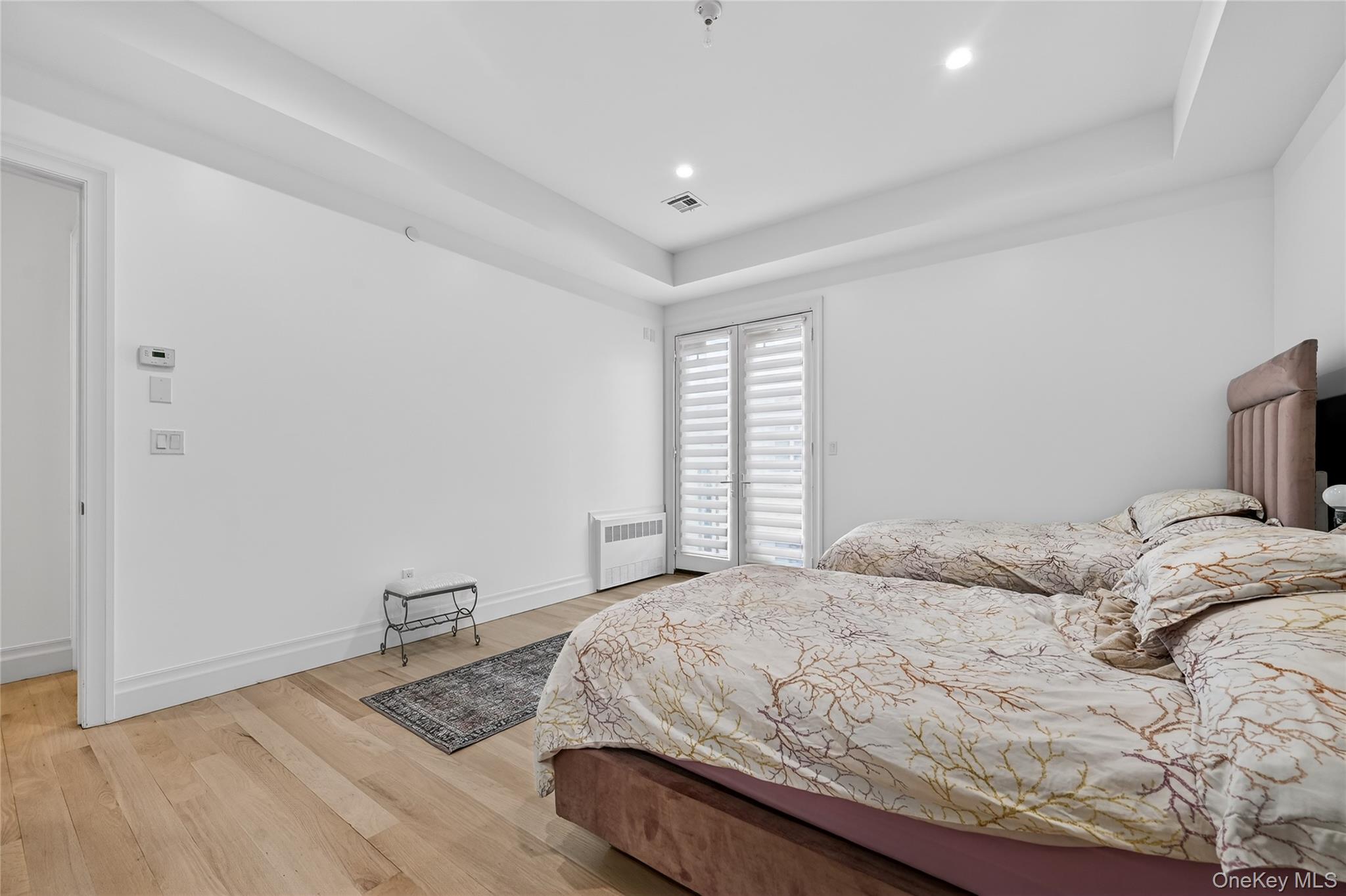 27 Ellish Parkway, Unit 202 Spring Valley, NY 10977 - Photo 37 of 50 a bedroom with a bed and a window