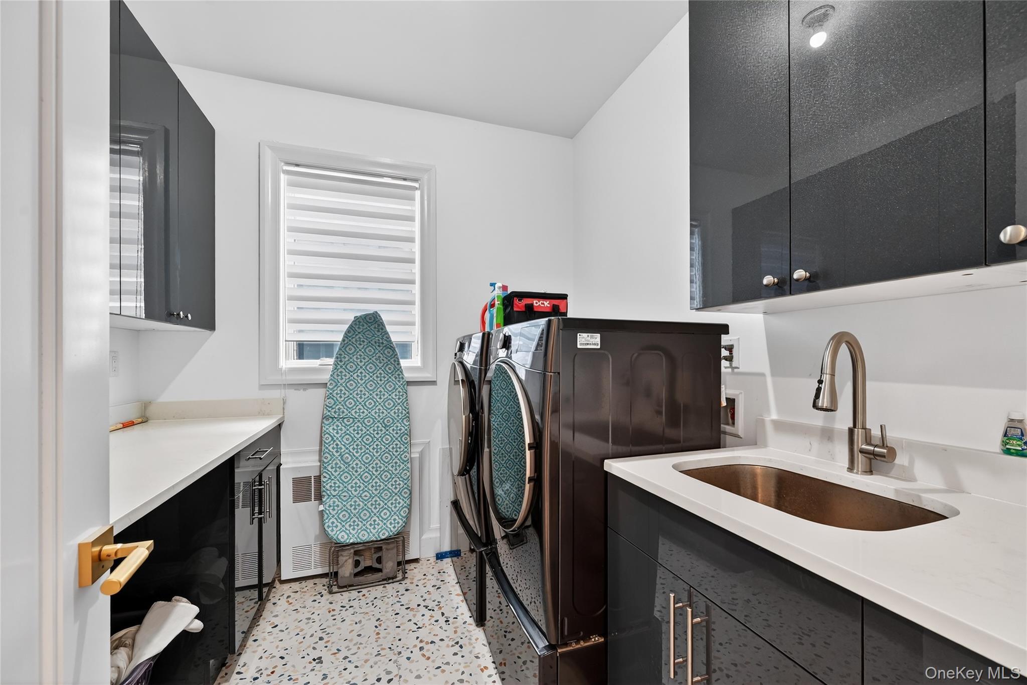 27 Ellish Parkway, Unit 202 Spring Valley, NY 10977 - Photo 40 of 50 a bathroom with a sink vanity and a mirror