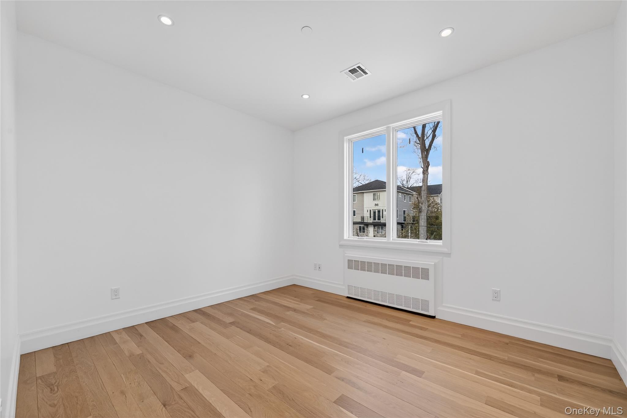 27 Ellish Parkway, Unit 202 Spring Valley, NY 10977 - Photo 44 of 50 a view of an empty room with a window