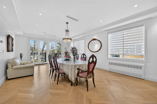 a dining room with furniture and window