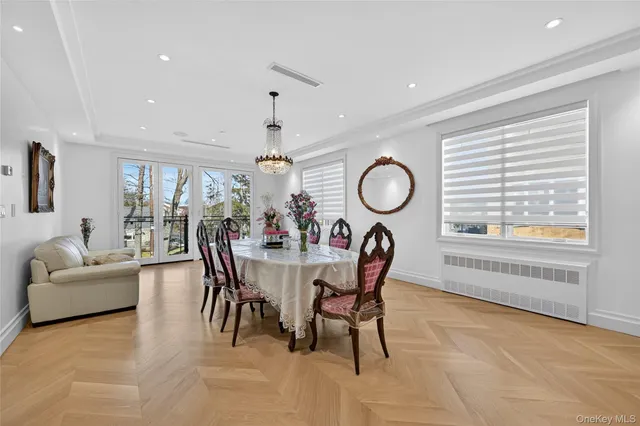 a dining room with furniture and window