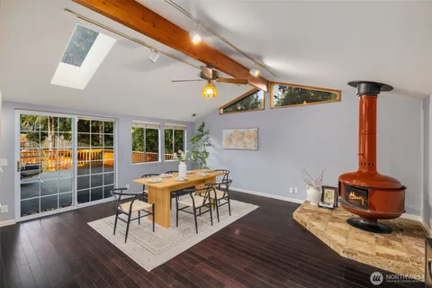 a living room with furniture and a table