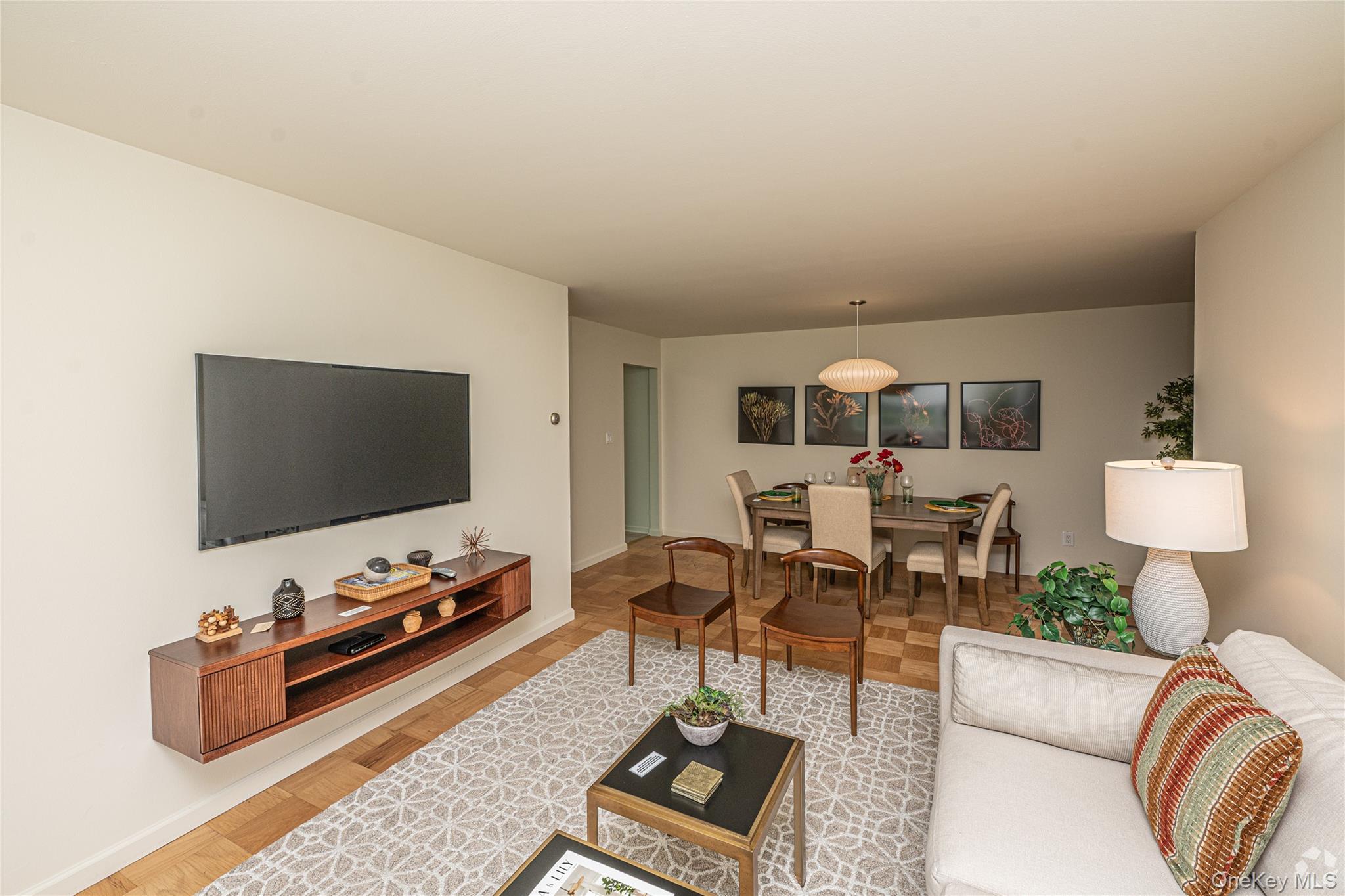 204 Milligan Road West Babylon, NY 11704 - Photo 3 of 12 a living room with furniture and a flat screen tv