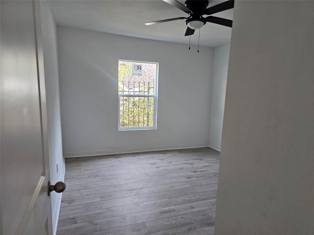 2426 South Tyler Street Dallas, TX 75224 - Photo 11 of 21 a view of an empty room with a window