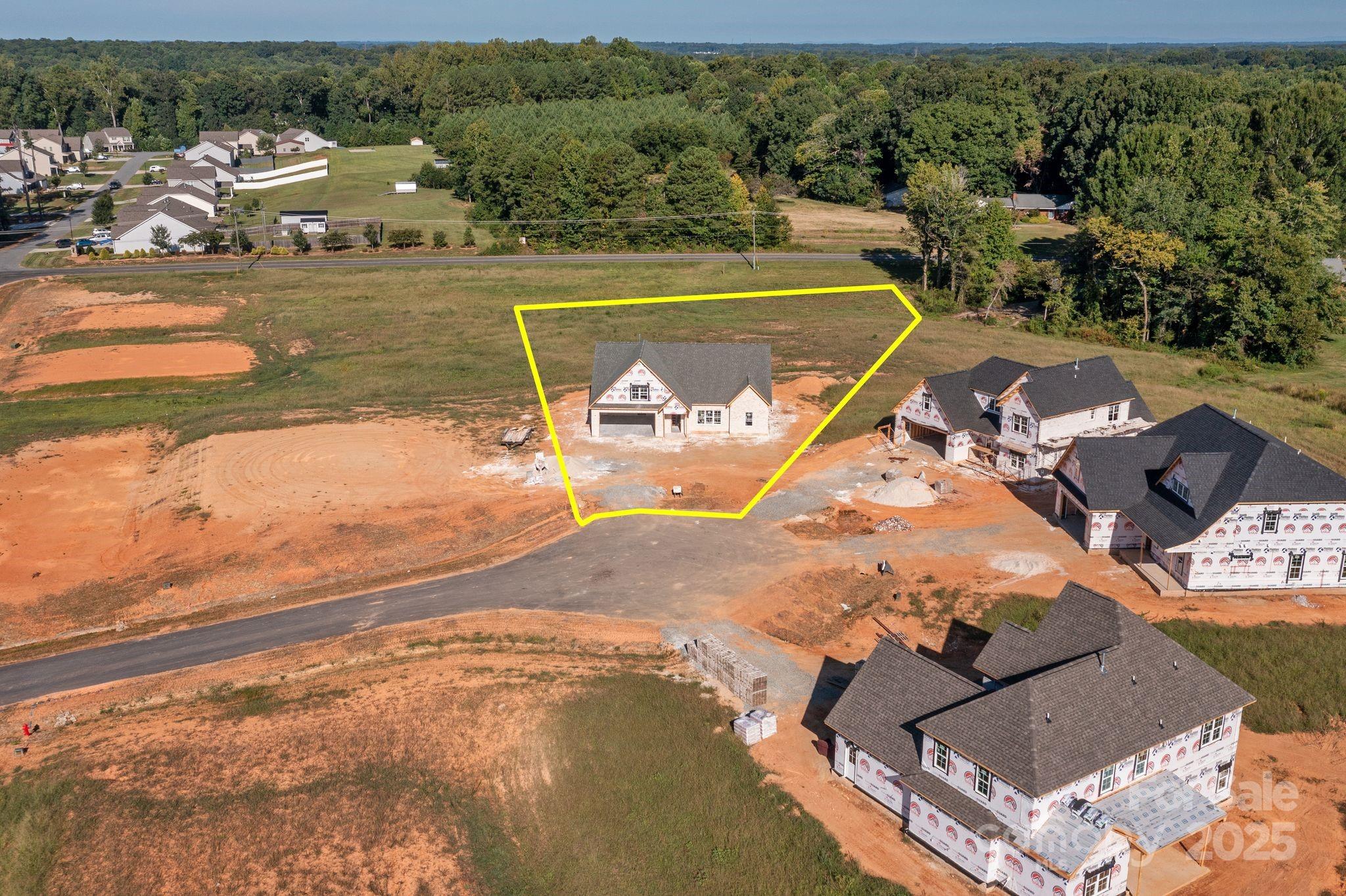 265 Sandpiper Drive, Unit 5 Lexington, NC 27295 - Photo 3 of 9 a view of a lake with a building in the background