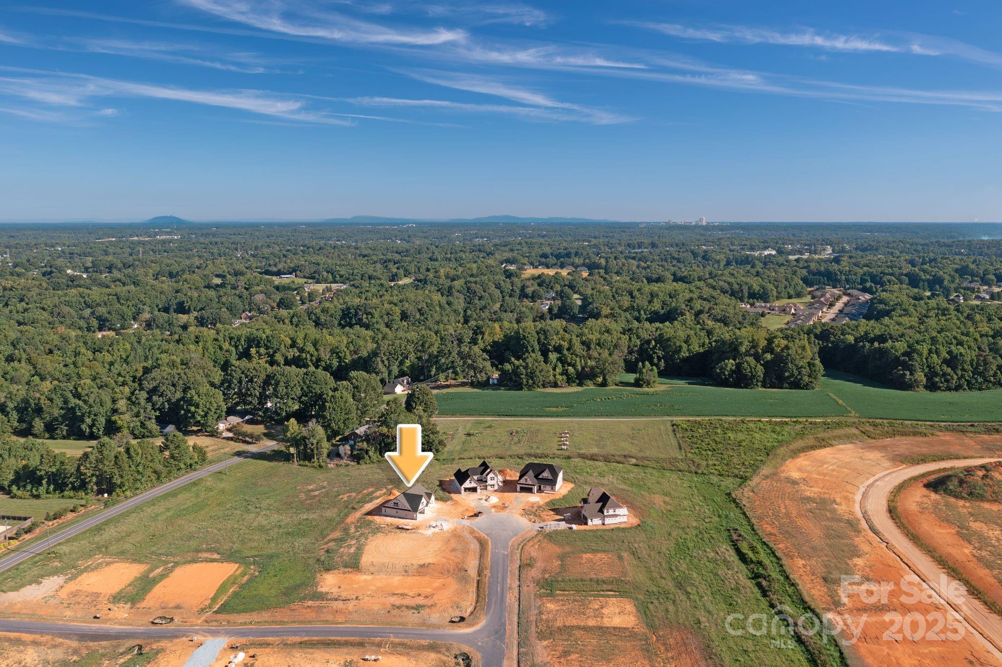 265 Sandpiper Drive, Unit 5 Lexington, NC 27295 - Photo 6 of 9 an aerial view of a house with a yard