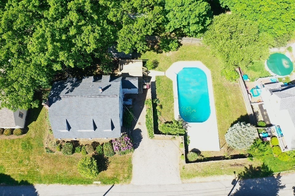 39 Squanto Road Weymouth, MA 02191 - Photo 11 of 13 an aerial view of a house with a swimming pool