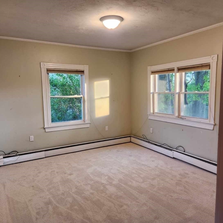 39 Squanto Road Weymouth, MA 02191 - Photo 8 of 13 an empty room with a window