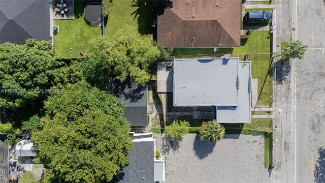 a backyard of a house with seating space