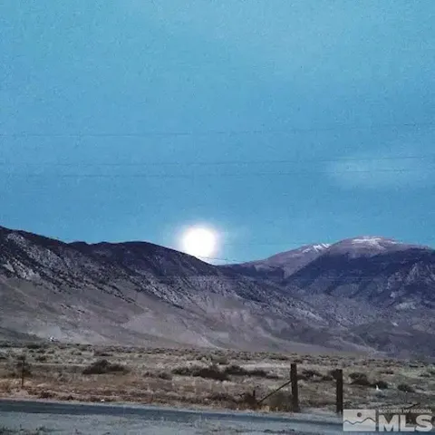 a view of mountains and valleys