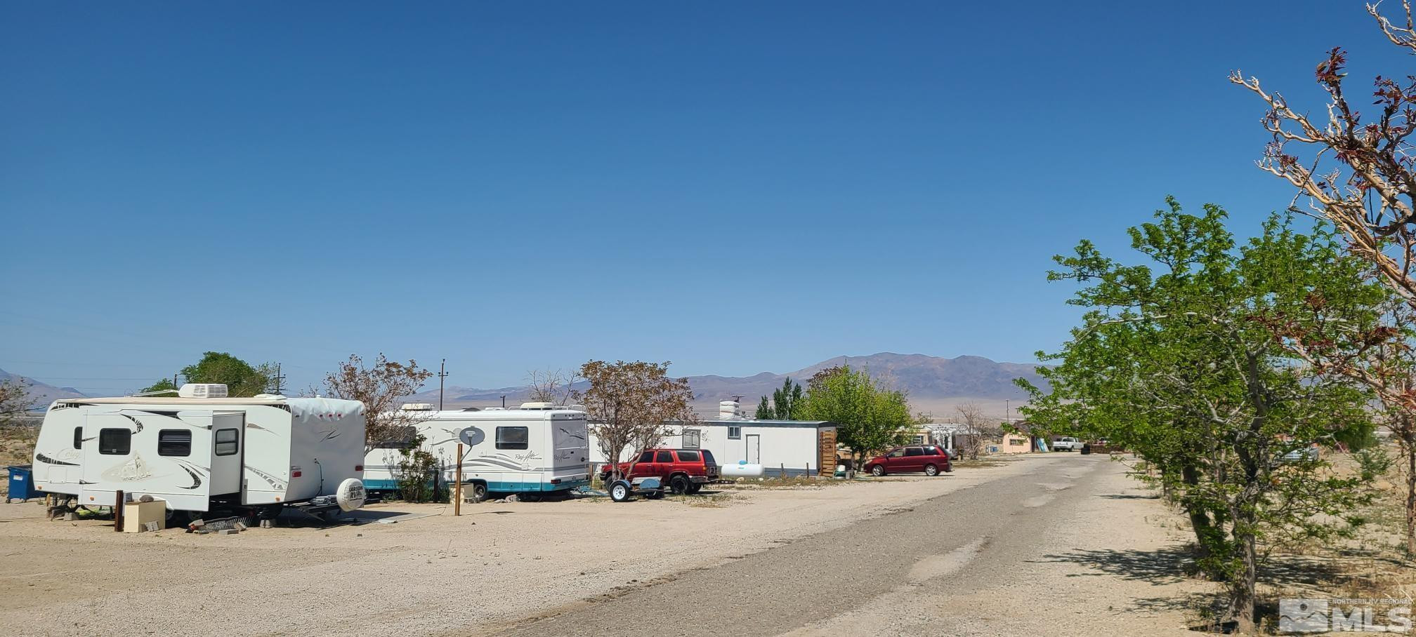 2000 Hwy 359 Hawthorne, NV 89415 - Photo 10 of 11 a couple of cars parked in front of a house