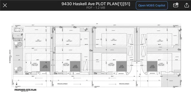 a black and white photo of a living room