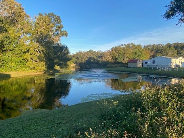 1371 Vine Street Daytona Beach, FL 32117 - Photo 4 of 9 a view of lake with green space