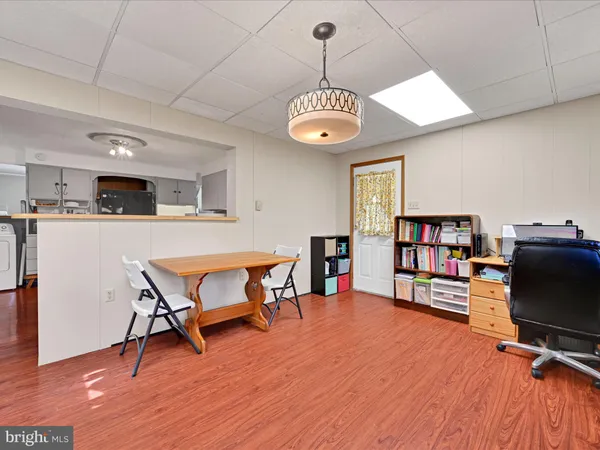 a livingroom with furniture and window