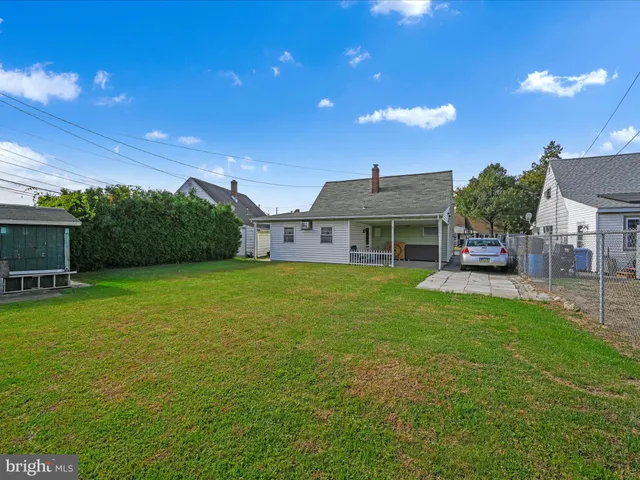 a view of a terrace with a table and chair