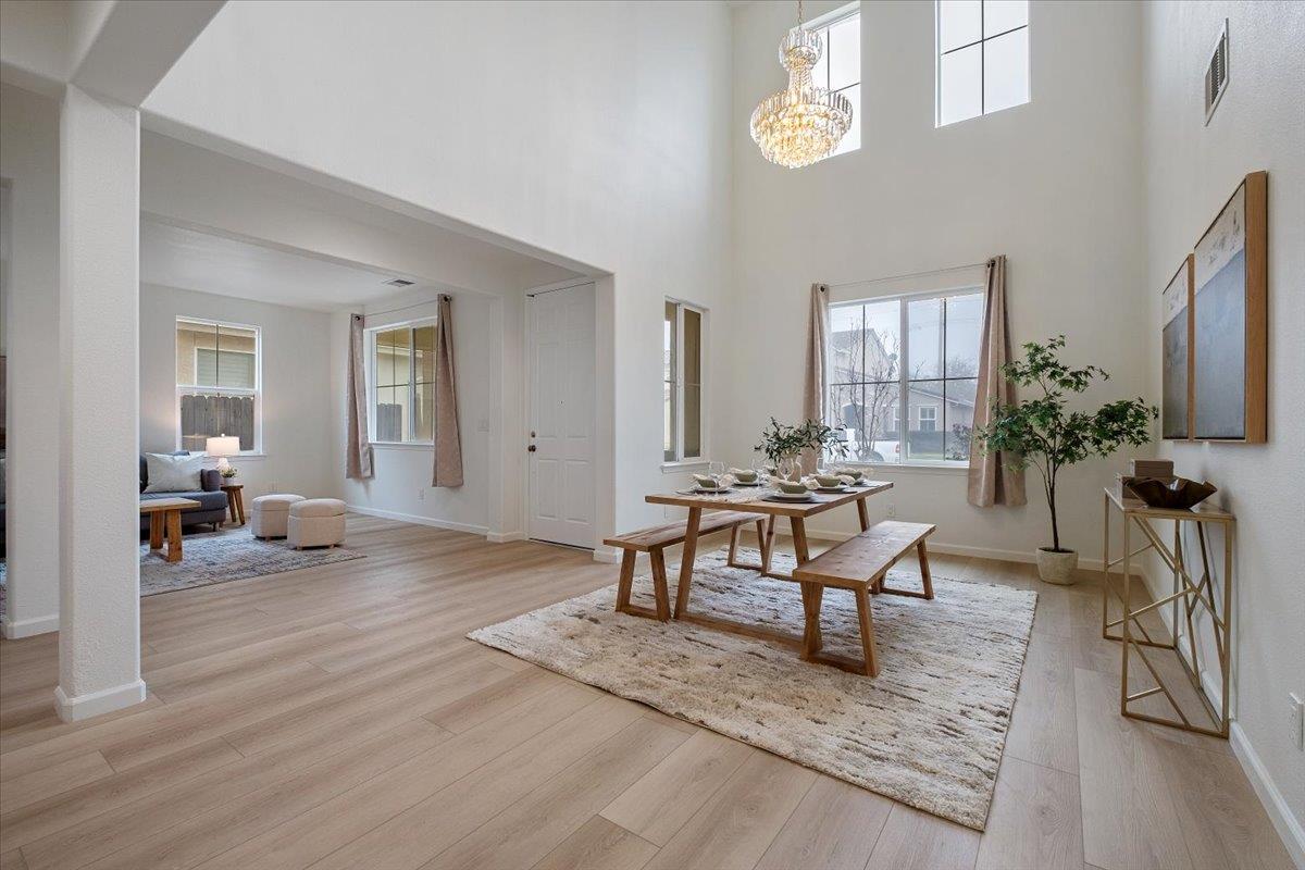 2413 Ventana View Way Modesto, CA 95355 - Photo 11 of 51 a living room with furniture and wooden floor