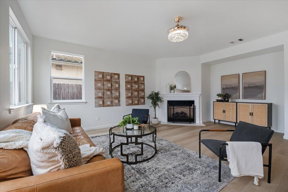 2413 Ventana View Way Modesto, CA 95355 - Photo 16 of 51 a living room with furniture and a fireplace