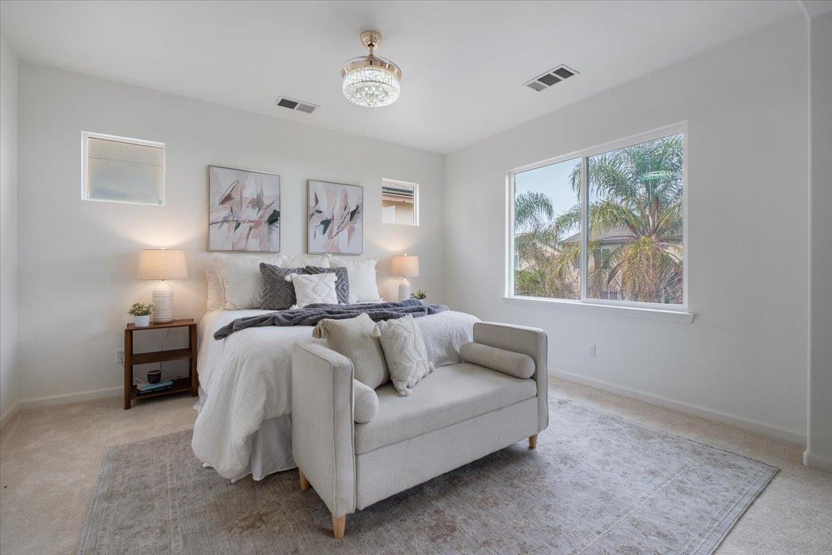 2413 Ventana View Way Modesto, CA 95355 - Photo 27 of 51 a bed room with furniture and a window
