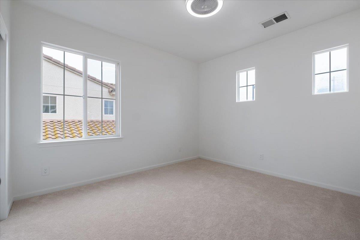 2413 Ventana View Way Modesto, CA 95355 - Photo 38 of 51 an empty room with a window