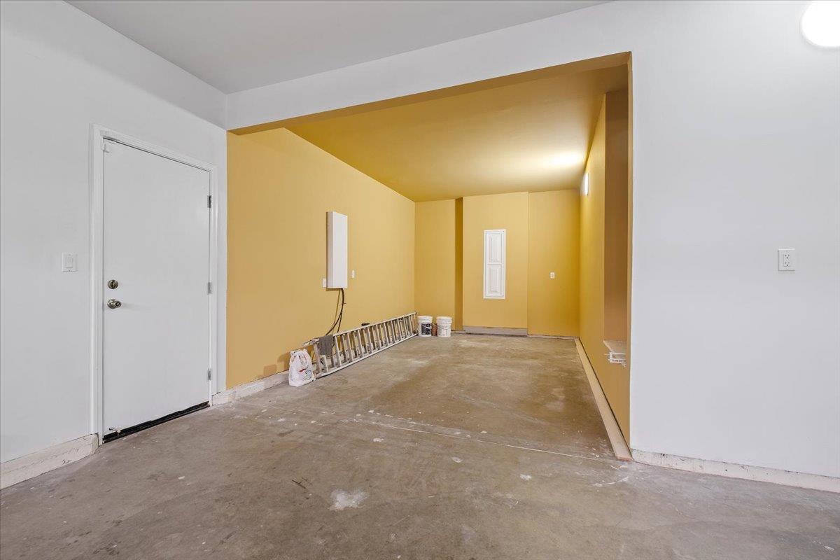 2413 Ventana View Way Modesto, CA 95355 - Photo 44 of 51 a view of a hallway with wooden shelves
